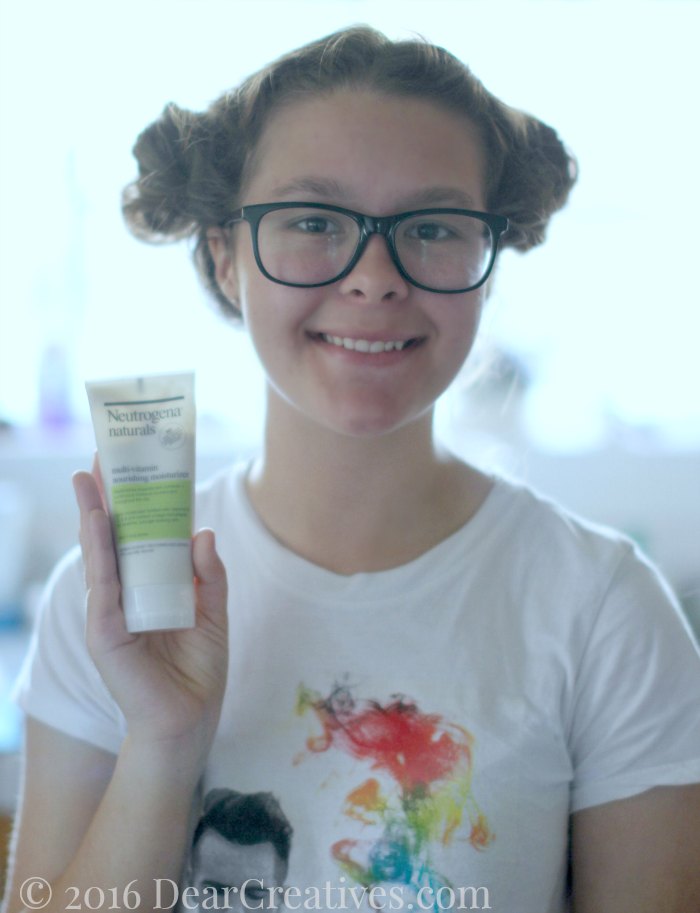 Natural Beauty Tips Neutrogena Naturals Young lady holding moisturizer lotion