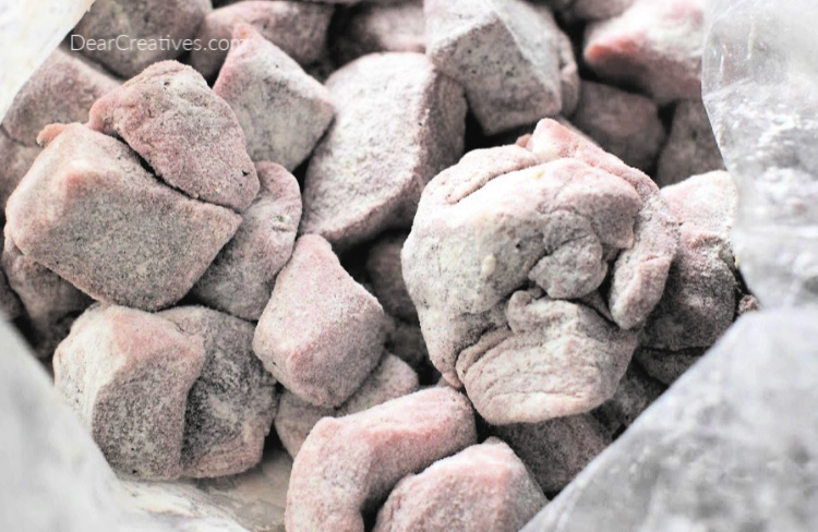 Cut up beef, flour, salt and pepper in a gallon size zip lock bag. Preparing and coating beef for dredging and braising. - Recipe at DearCreatives.com