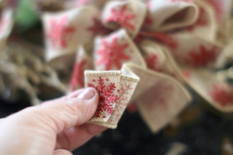 grapevine wreath ideas © 2017 Theresa Huse folding over the back of the wired ribbon to be glued to finish off the handmade bow