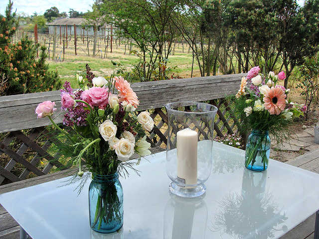 wedding flowers in mason jars days before the wedding to allow blooms to open DearCreatives.com © Theresa Huse