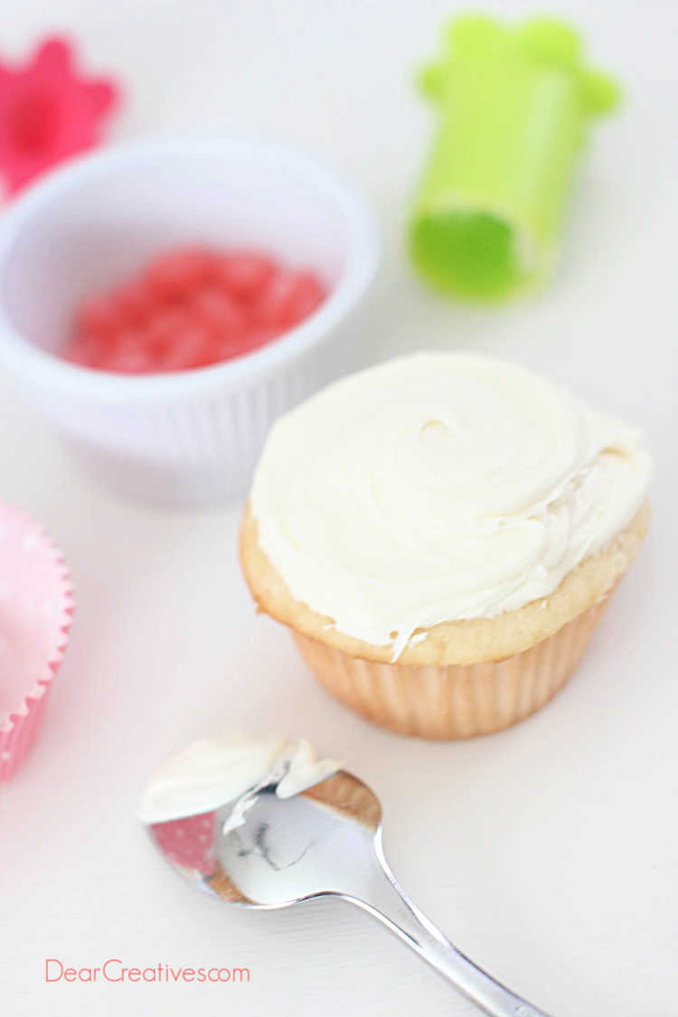 Frost your cupcakes and decorate them for your party or theme. See how to make jelly bean cupcakes and grab the cupcake recipe at DearCreatives.com