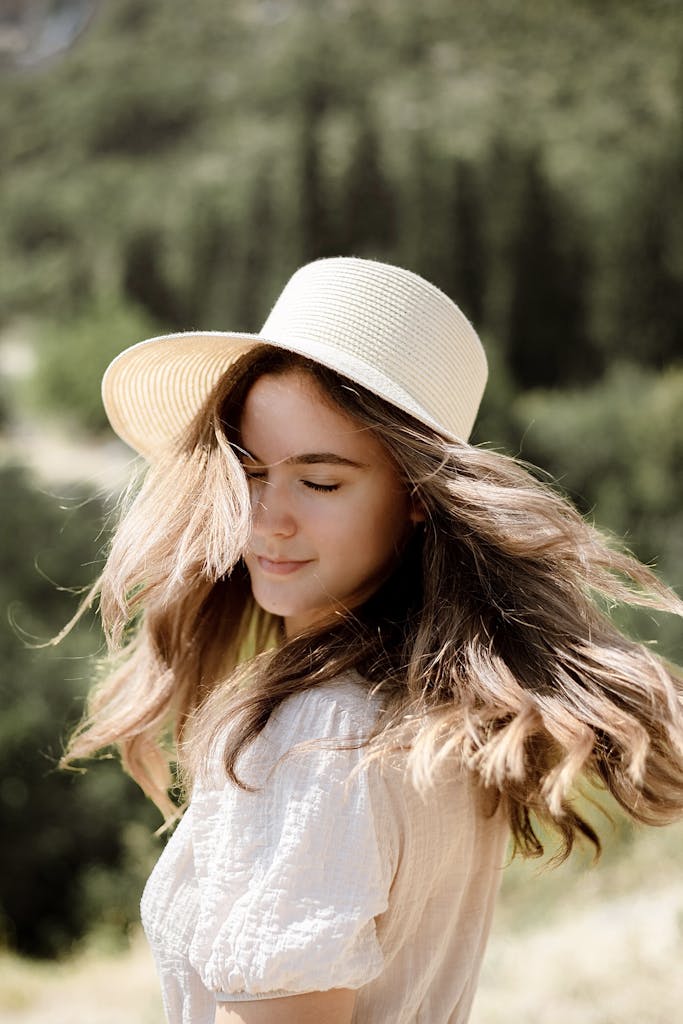 Pretty Girl in Hat With Long Pretty Hair - Tips for summer haircare - DearCreatives.com