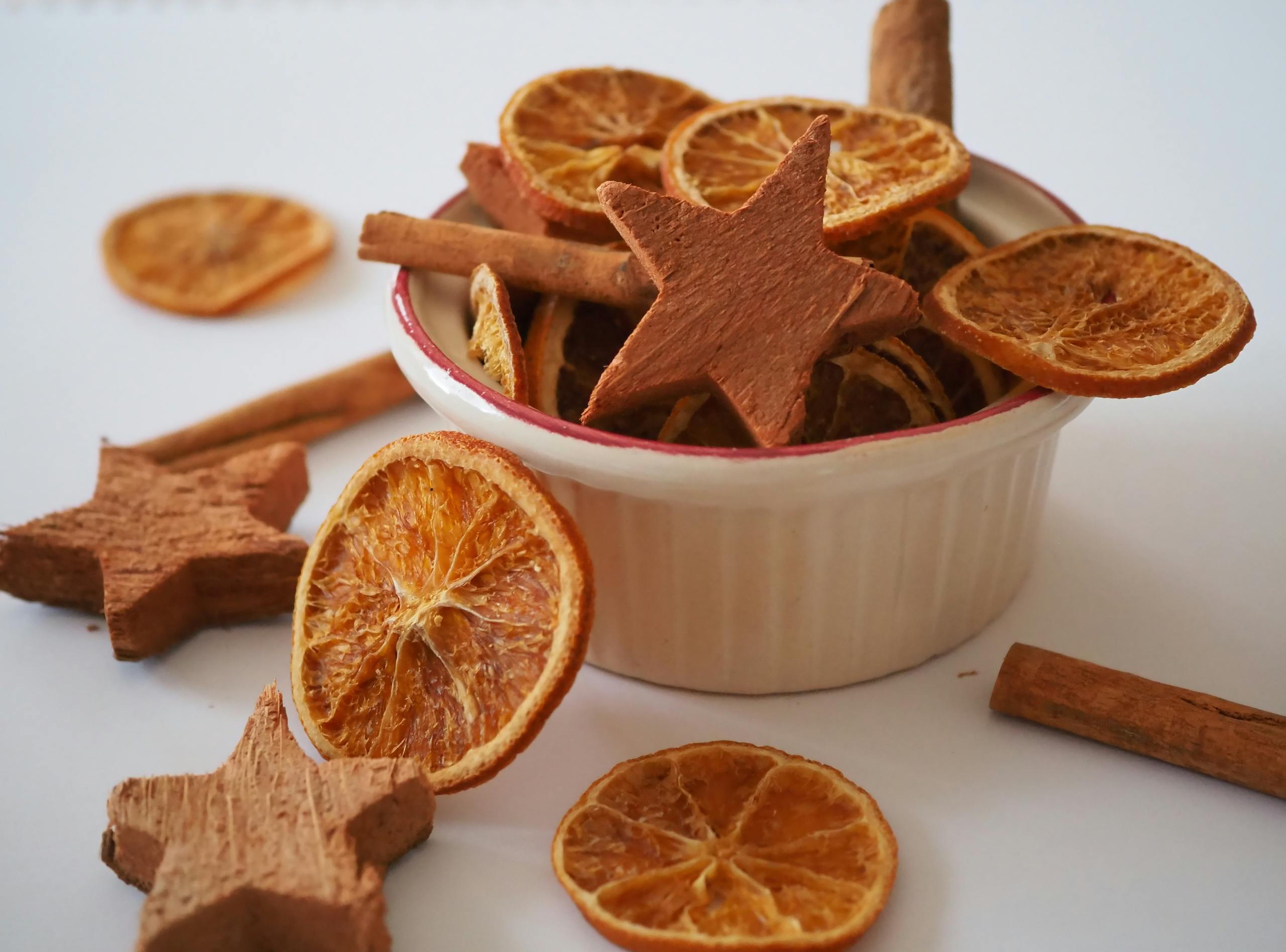 holiday potpourri featuring dried oranges, star anise, and cinnamon sticks.