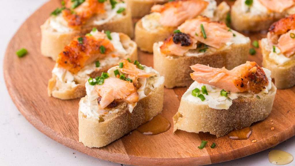 Close up of crostini with salmon. Get the Quick and Easy Recipe at DearCreatives.com