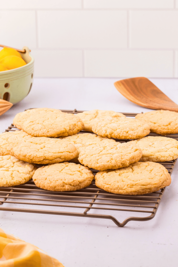 Lemon Crinkle Cookies Recipe - These are easy lemon cookies to make. Use a large scoop of cookie dough to make delicious, real lemon flavored cookies. DearCreatives.com