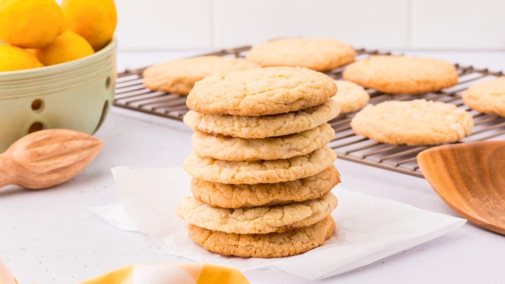 Lemon Crinkle Cookies these are homemade lemon cookies made with real lemons, rolled in sugar, chilled and baked in the oven for a big lemon cookies! They are so good! Recipe at DearCreatives.com