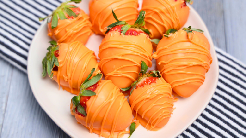 Chocolate Covered Strawberries - These dipped chocolate covered strawberries look like carrots. Perfect for spring, Easter, themed parties. Easy to make and serve. Get the tips and recipe. DearCreatives.com