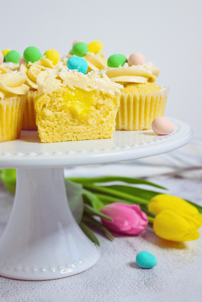 Lemon Curd Cupcakes Vanilla cupcakes with lemon curd filling. An easy recipe with homemade cupcakes and lemon curd. Get the recipe at DearCreatives.com 