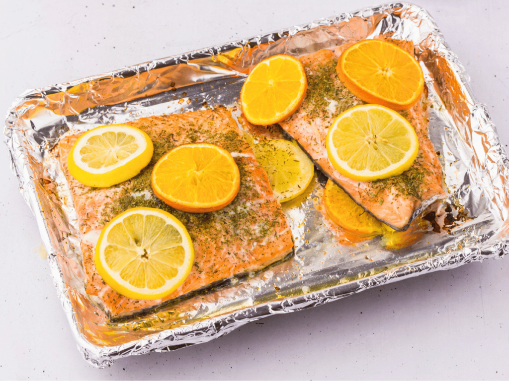 sheet pan salmon is a quick salmon recipe that is easy to make with a few ingredients. Serve with your favorite sides or our recommendations. Get the recipe at DearCreatives.com